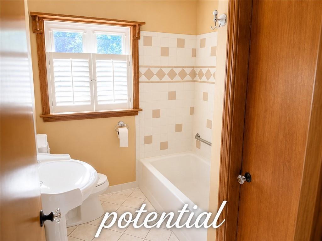 644 Freeport Road Butler, PA 16002 - Photo 27 of 50 a bathroom with a bathtub and a shower