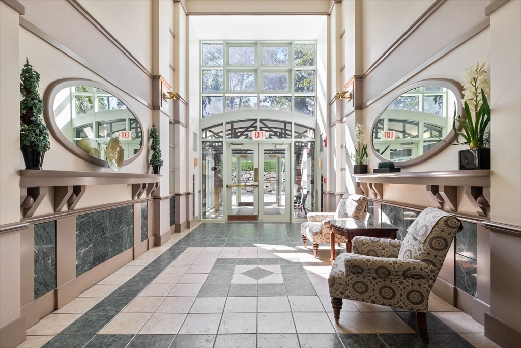 269 Cambridge Road, Unit 203 Woburn, MA 01801 - Photo 18 of 26 a view of a entryway with furniture