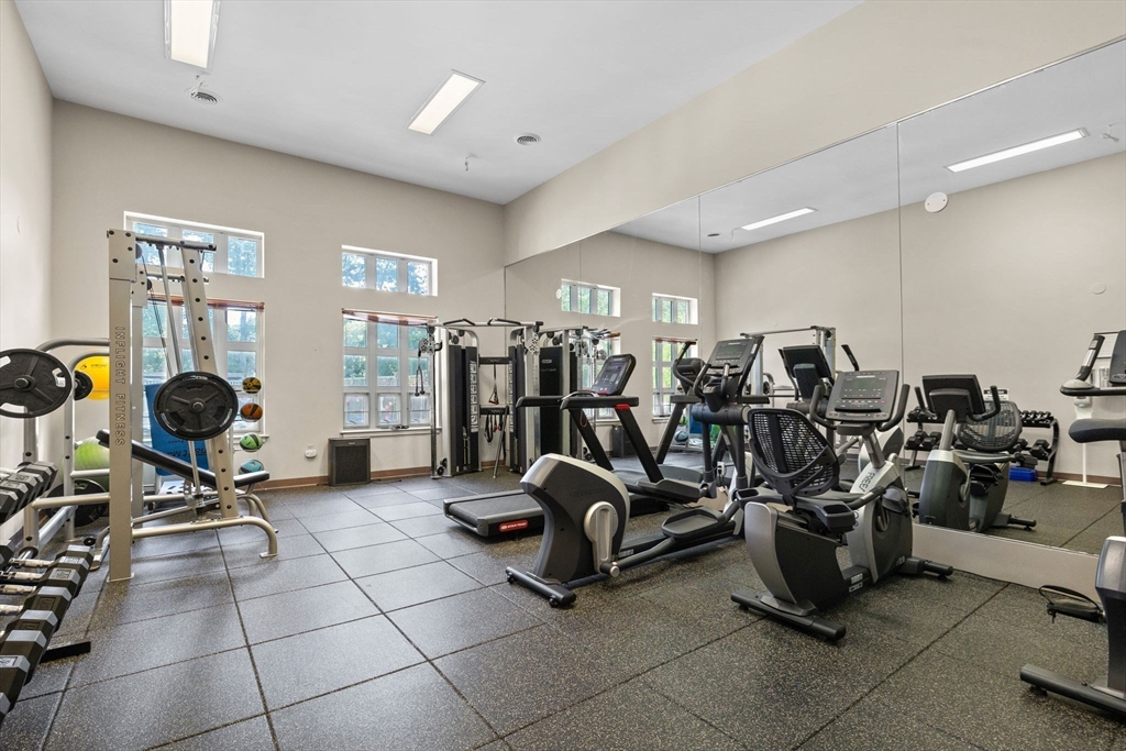 269 Cambridge Road, Unit 203 Woburn, MA 01801 - Photo 22 of 26 a view of a room with gym equipment
