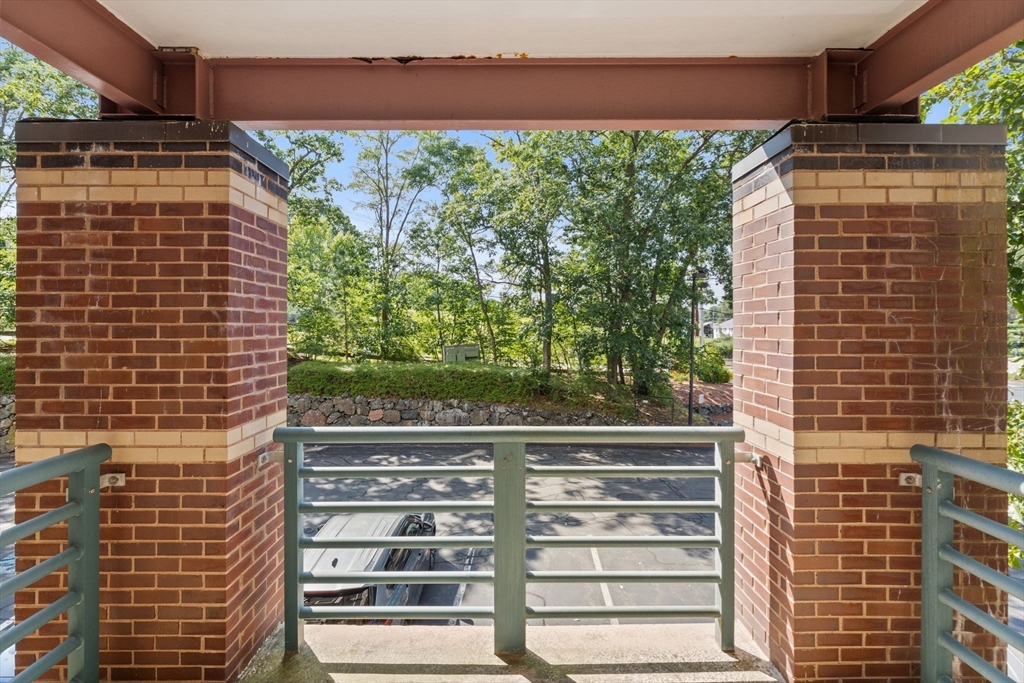 269 Cambridge Road, Unit 203 Woburn, MA 01801 - Photo 9 of 26 a view of a building from a window
