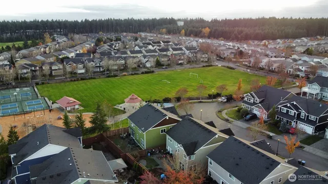 an aerial view of a house with a garden