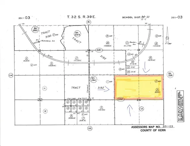 a black and white photo of a beach