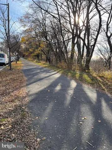 a view of road with trees