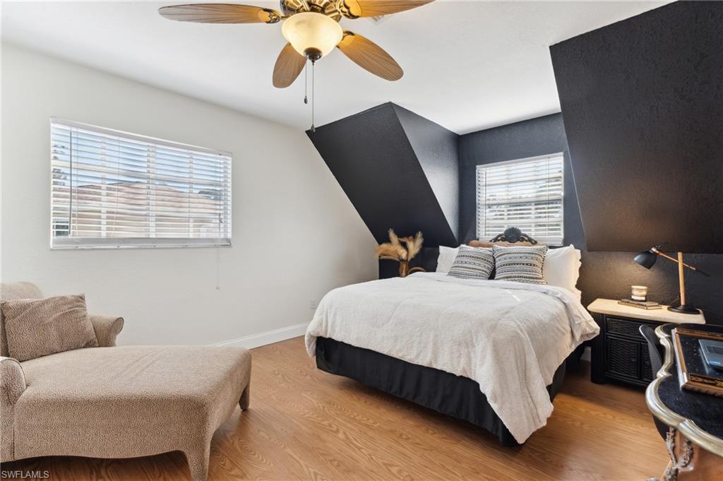 8457 Wren Road Fort Myers, FL 33967 - Photo 29 of 50 Bedroom with ceiling fan and light hardwood / wood-style flooring