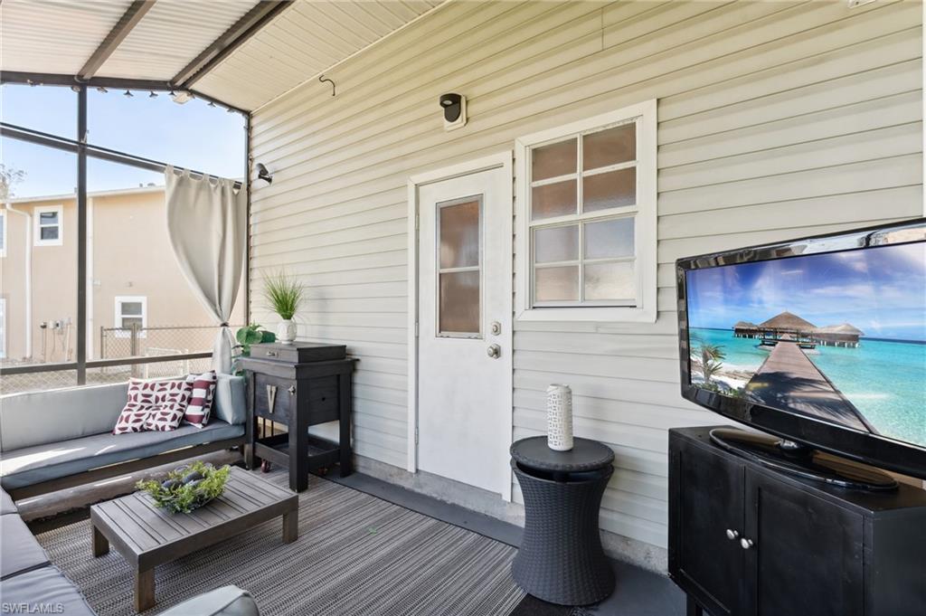 8457 Wren Road Fort Myers, FL 33967 - Photo 38 of 50 Wooden deck featuring an outdoor living space