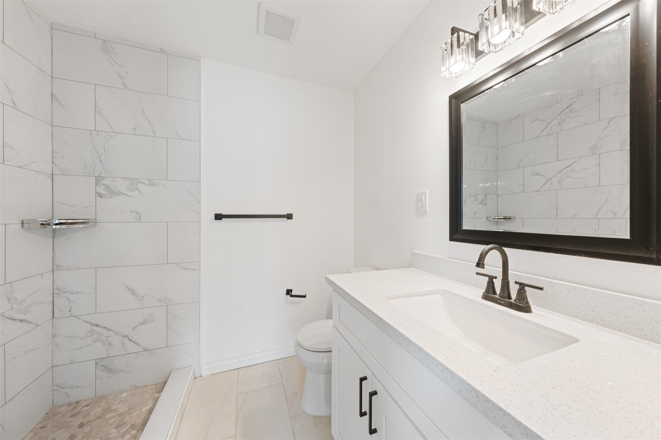 4356 Phlox Street Houston, TX 77051 - Photo 19 of 25 a bathroom with a sink a toilet and shower