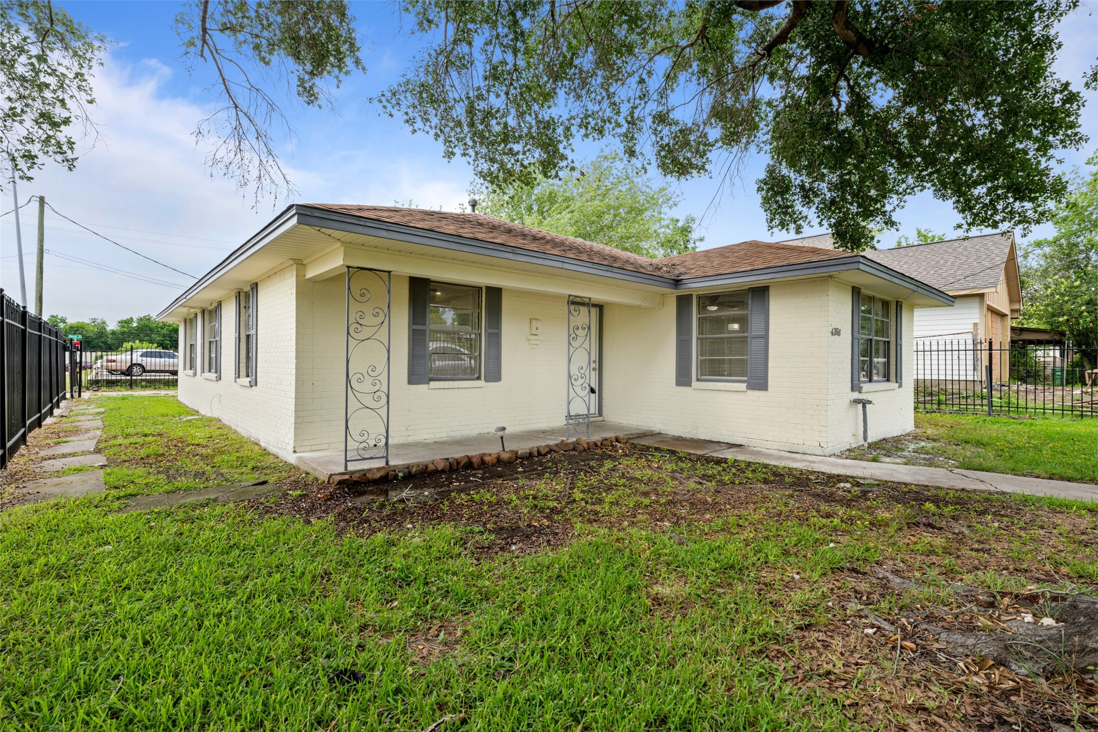 4356 Phlox Street Houston, TX 77051 - Photo 2 of 25 a front view of a house with a yard