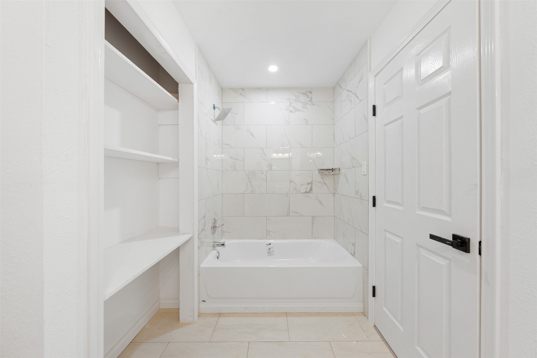 4356 Phlox Street Houston, TX 77051 - Photo 21 of 25 a spacious bathroom with a bathtub and a shower