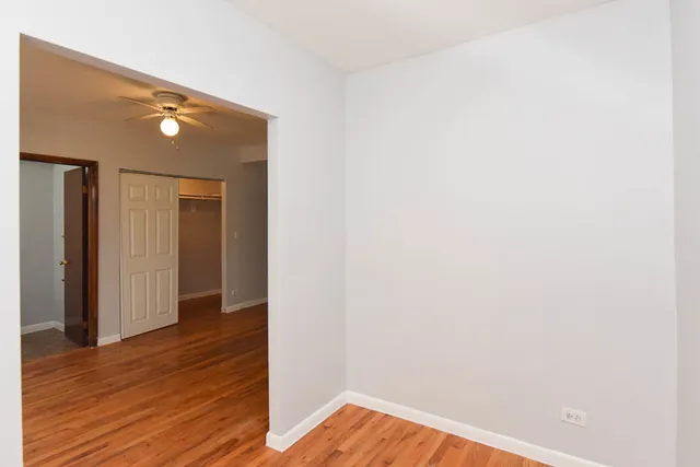 a view of a livingroom with wooden floor