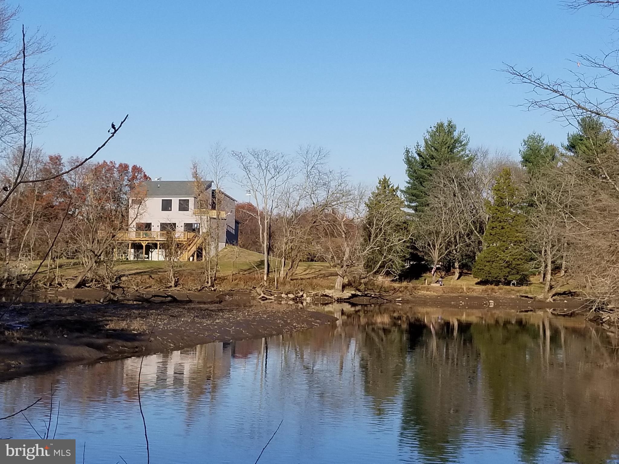 11 Forklanding Road Cinnaminson, NJ 08077 - Photo 2 of 77 a view of a lake with houses