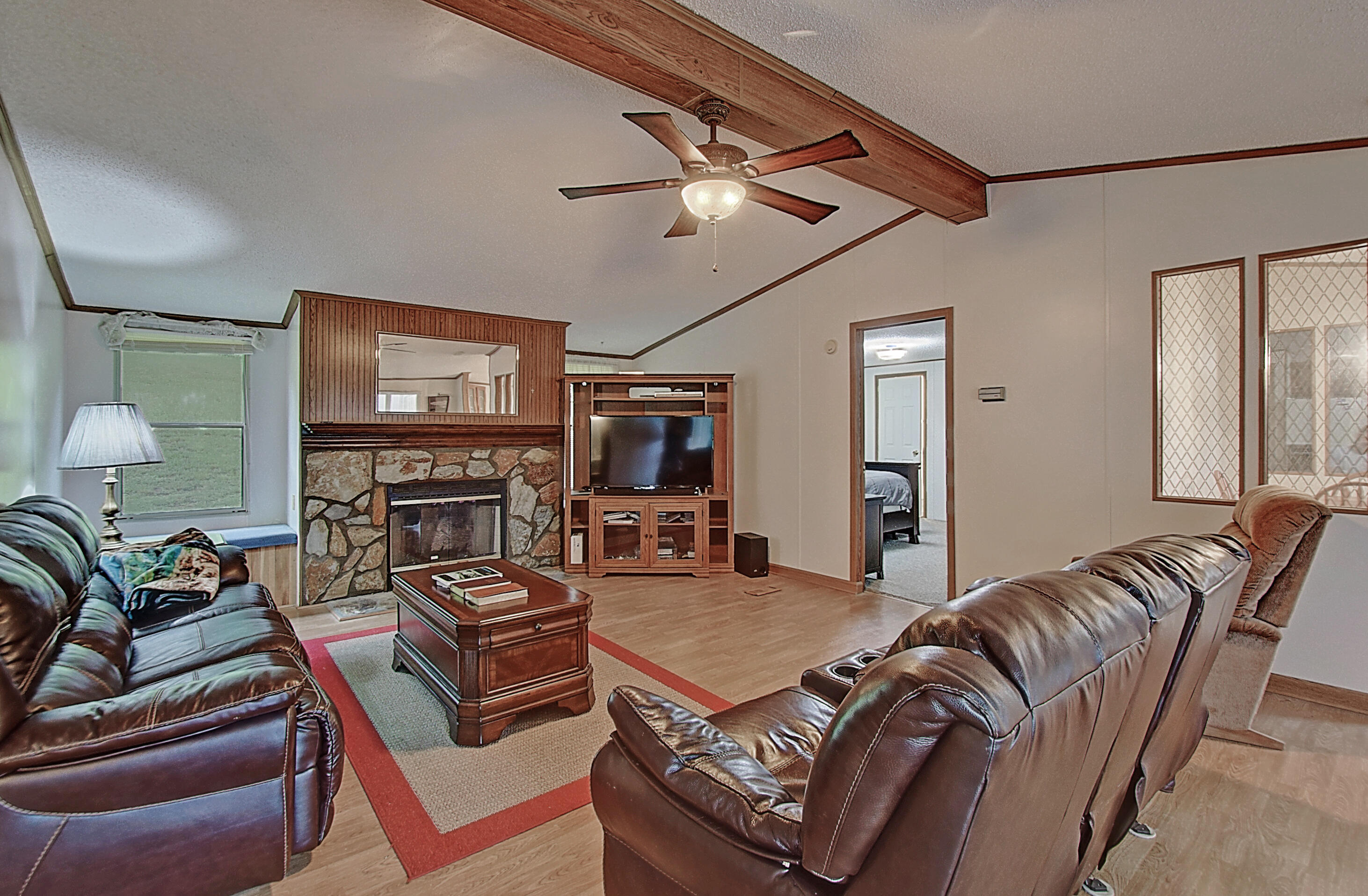 418 Horace Dillow Road Limestone, TN 37681 - Photo 19 of 57 living room with gas fireplace