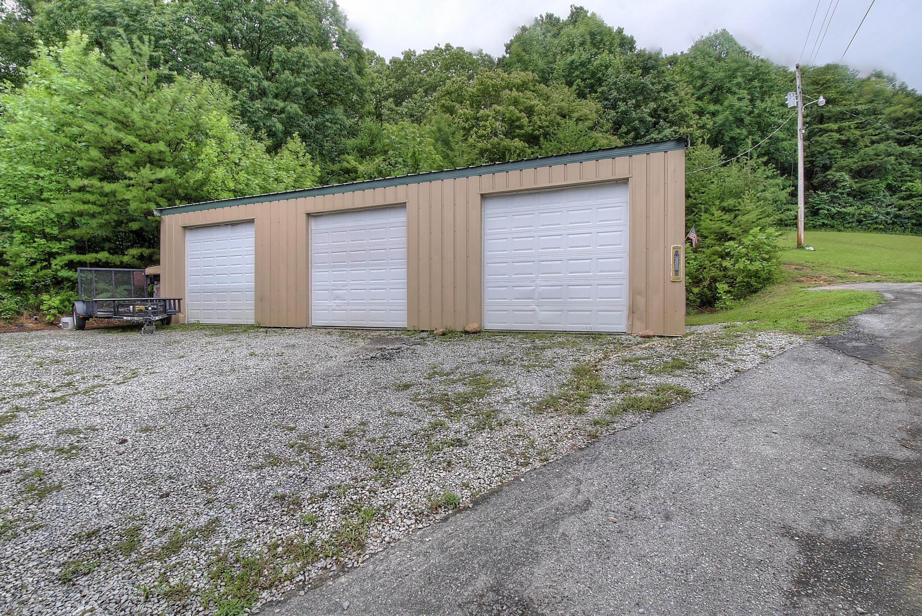 418 Horace Dillow Road Limestone, TN 37681 - Photo 38 of 57 1440 sq ft garage with over-sized doors