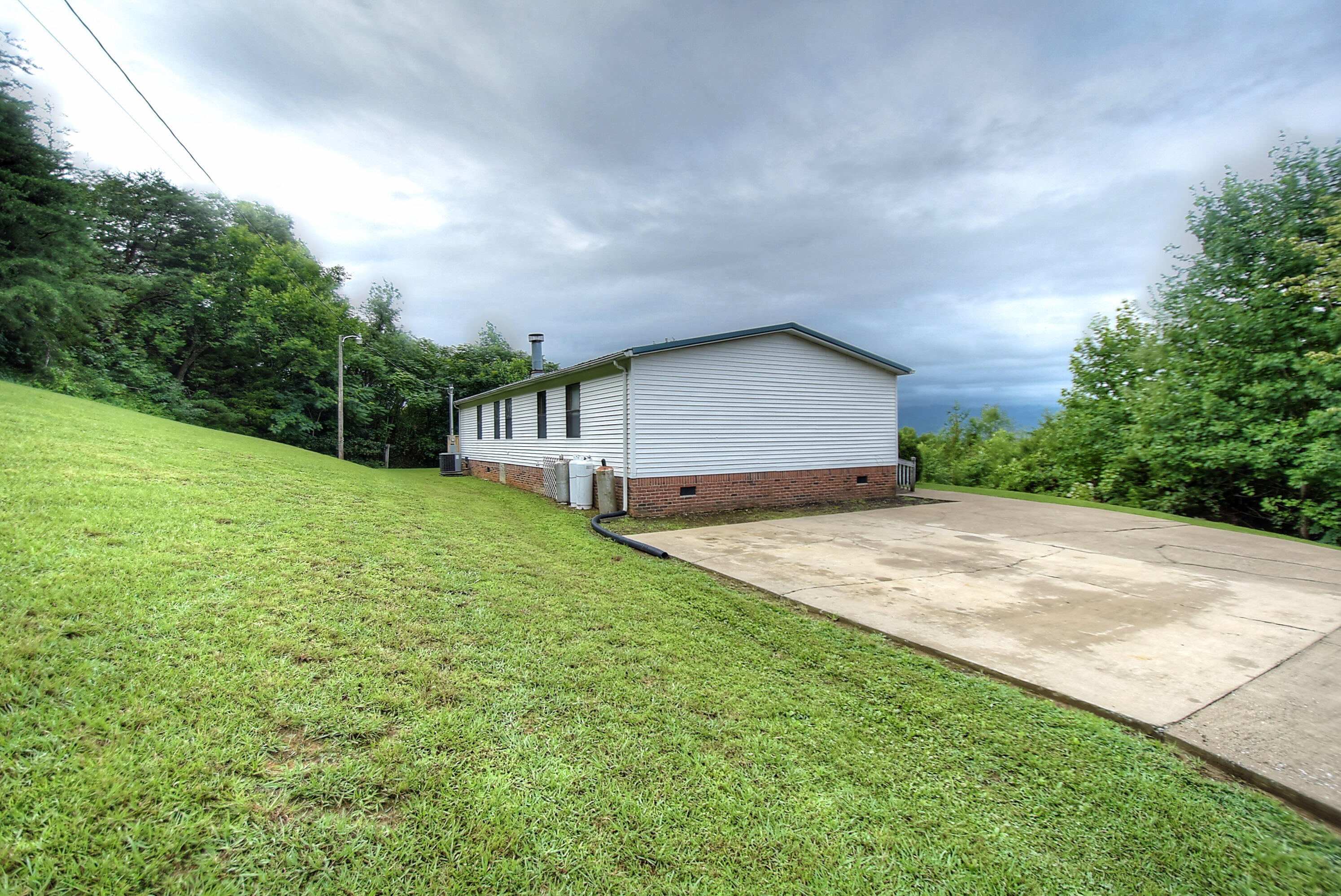 418 Horace Dillow Road Limestone, TN 37681 - Photo 43 of 57 side view