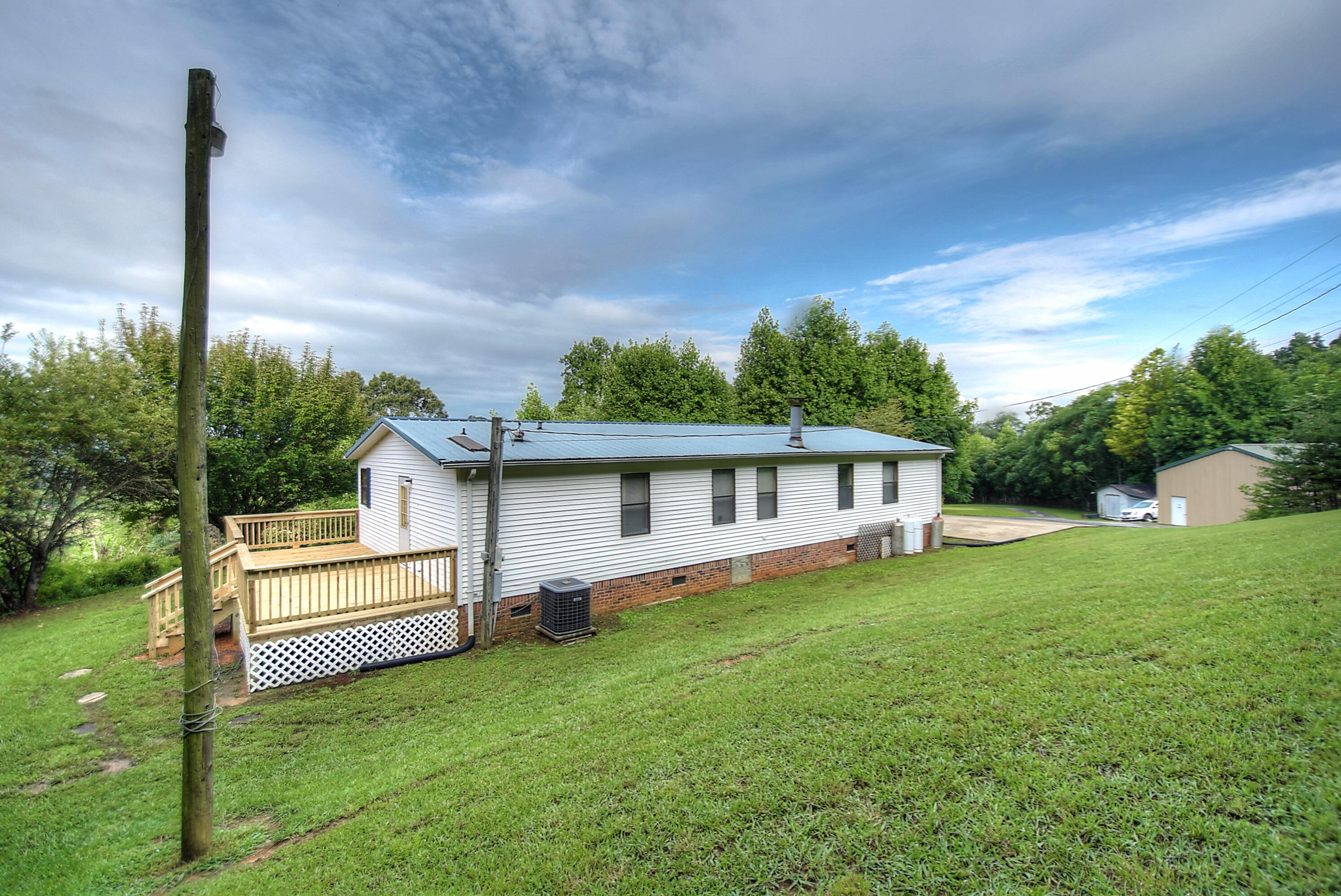 418 Horace Dillow Road Limestone, TN 37681 - Photo 50 of 57 new side deck