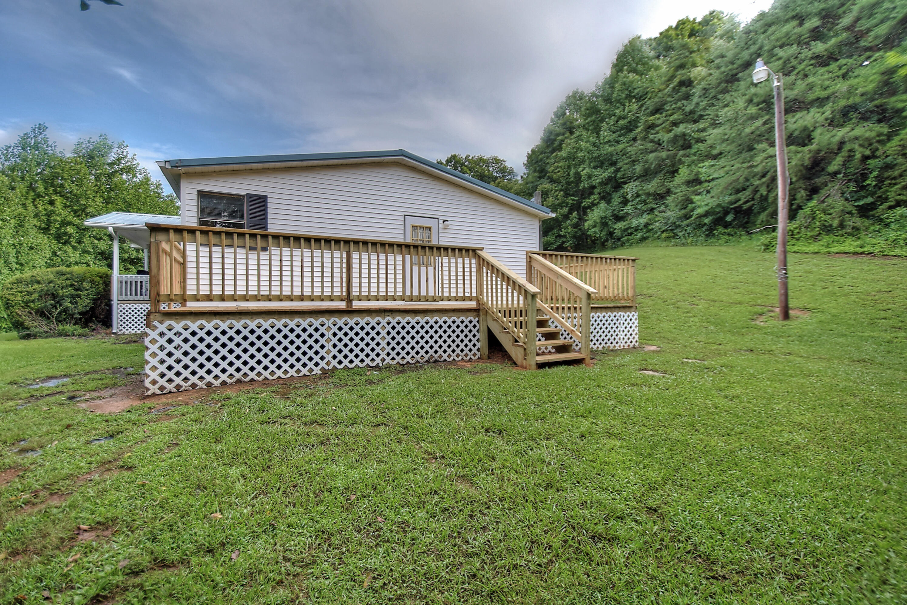 418 Horace Dillow Road Limestone, TN 37681 - Photo 52 of 57 new side deck
