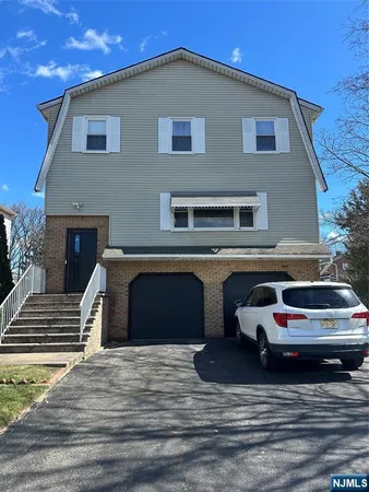 a car parked in front of a house