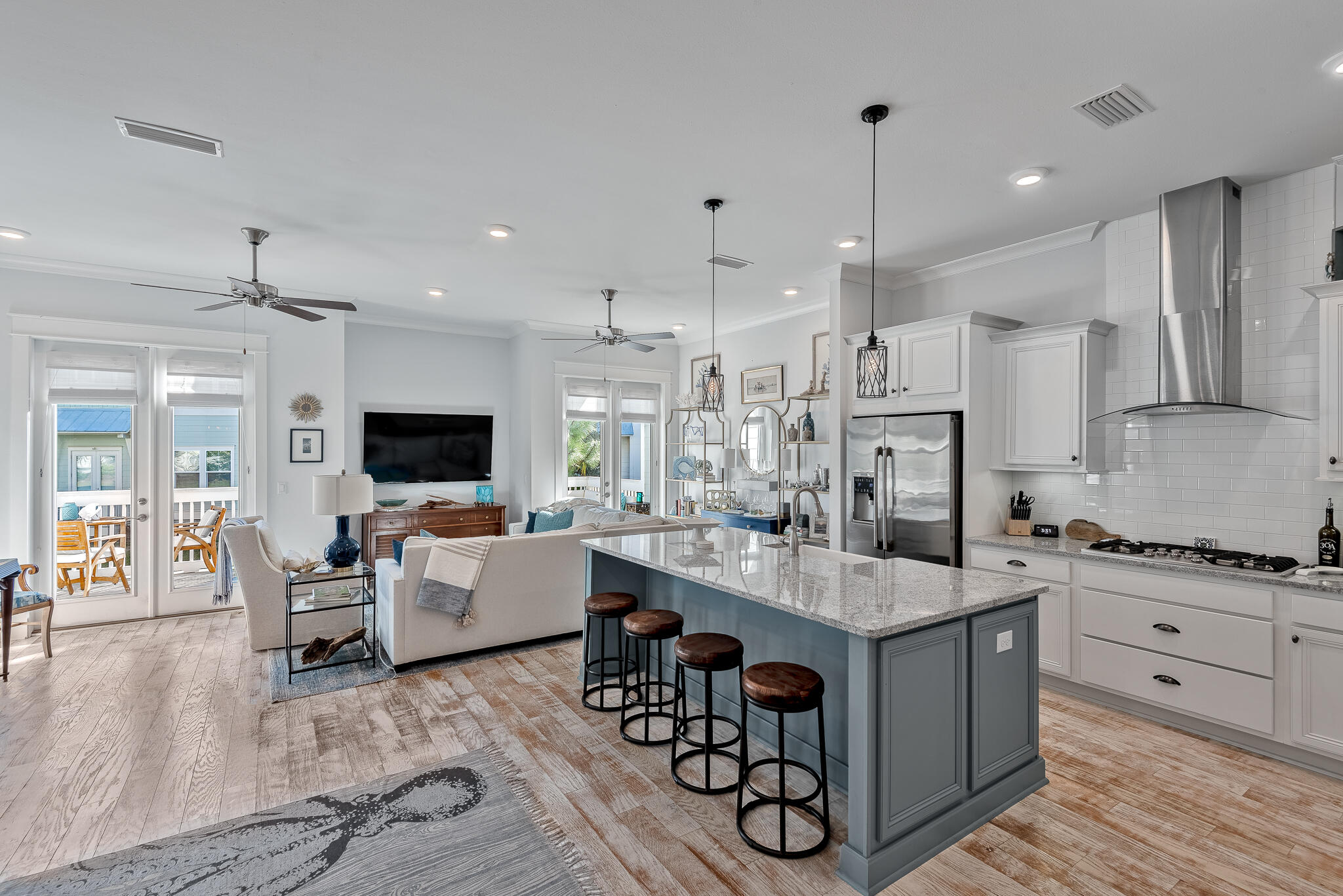 Undisclosed Address Inlet Beach, FL 32461 - Photo 7 of 25 a large kitchen with stainless steel appliances lots of counter space and windows