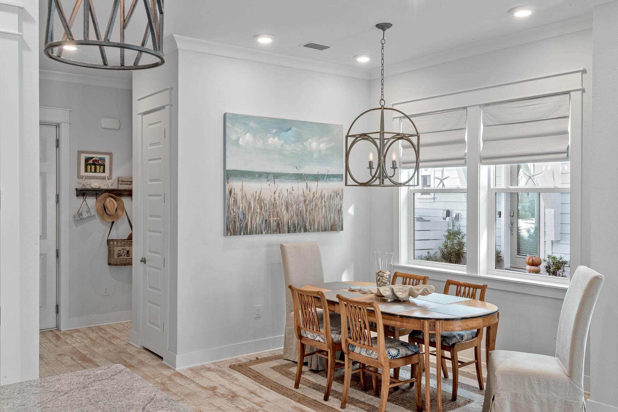 Undisclosed Address Inlet Beach, FL 32461 - Photo 8 of 25 a view of a dining room with furniture window and wooden floor