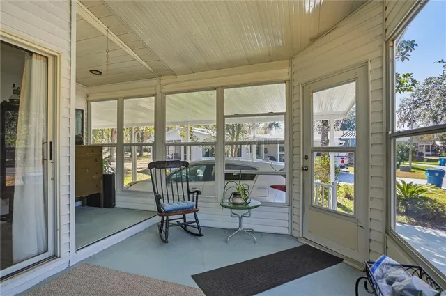 a work room with furniture and a window