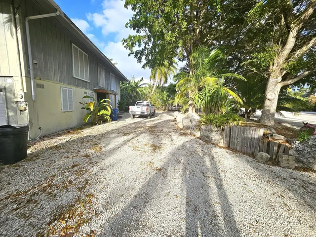 a view of a back yard of the house
