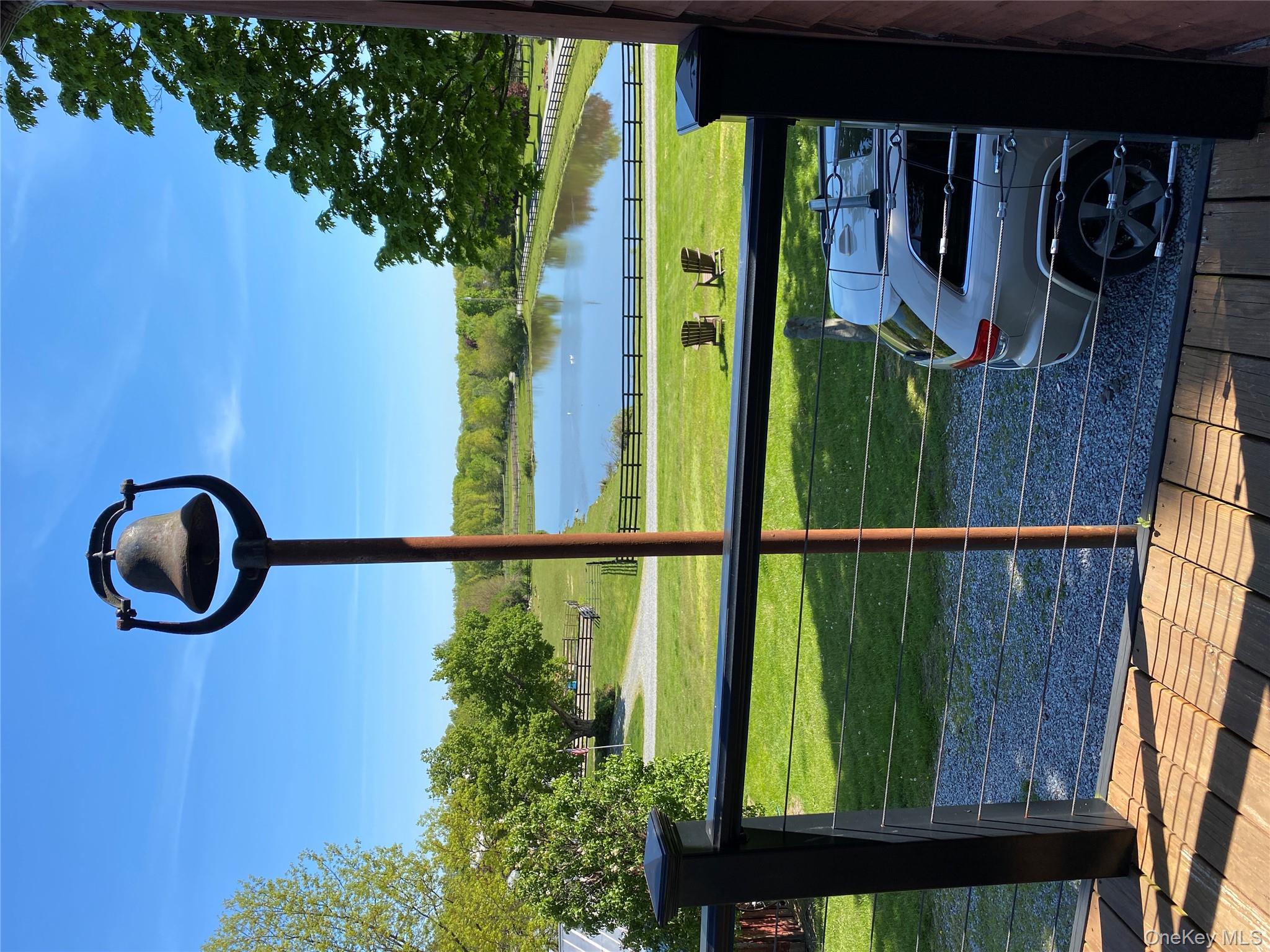 53 Day Road Campbell Hall, NY 10916 - Photo 14 of 31 a view of a back yard with a wooden fence