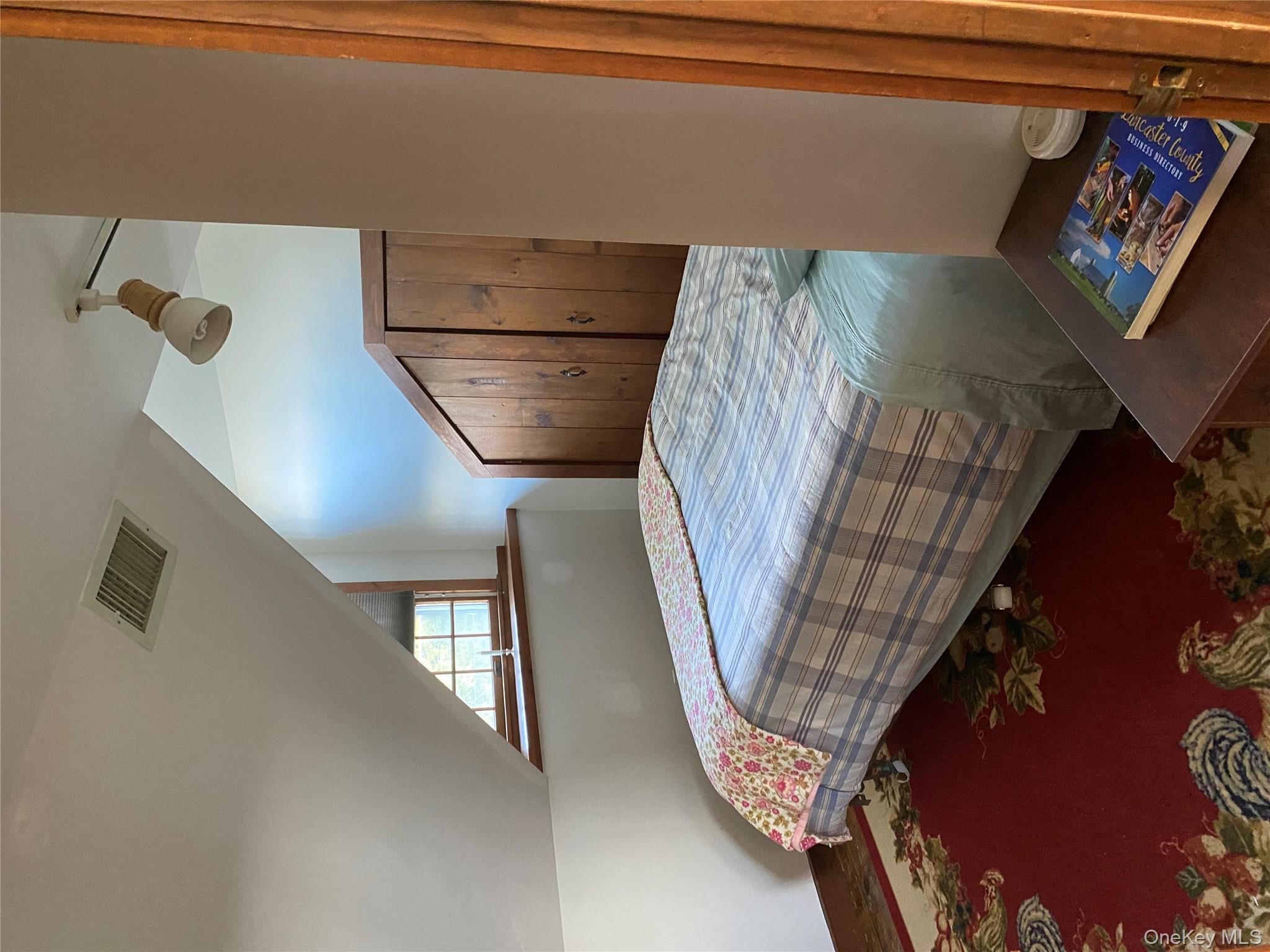 53 Day Road Campbell Hall, NY 10916 - Photo 20 of 31 a bedroom with a bed and a window