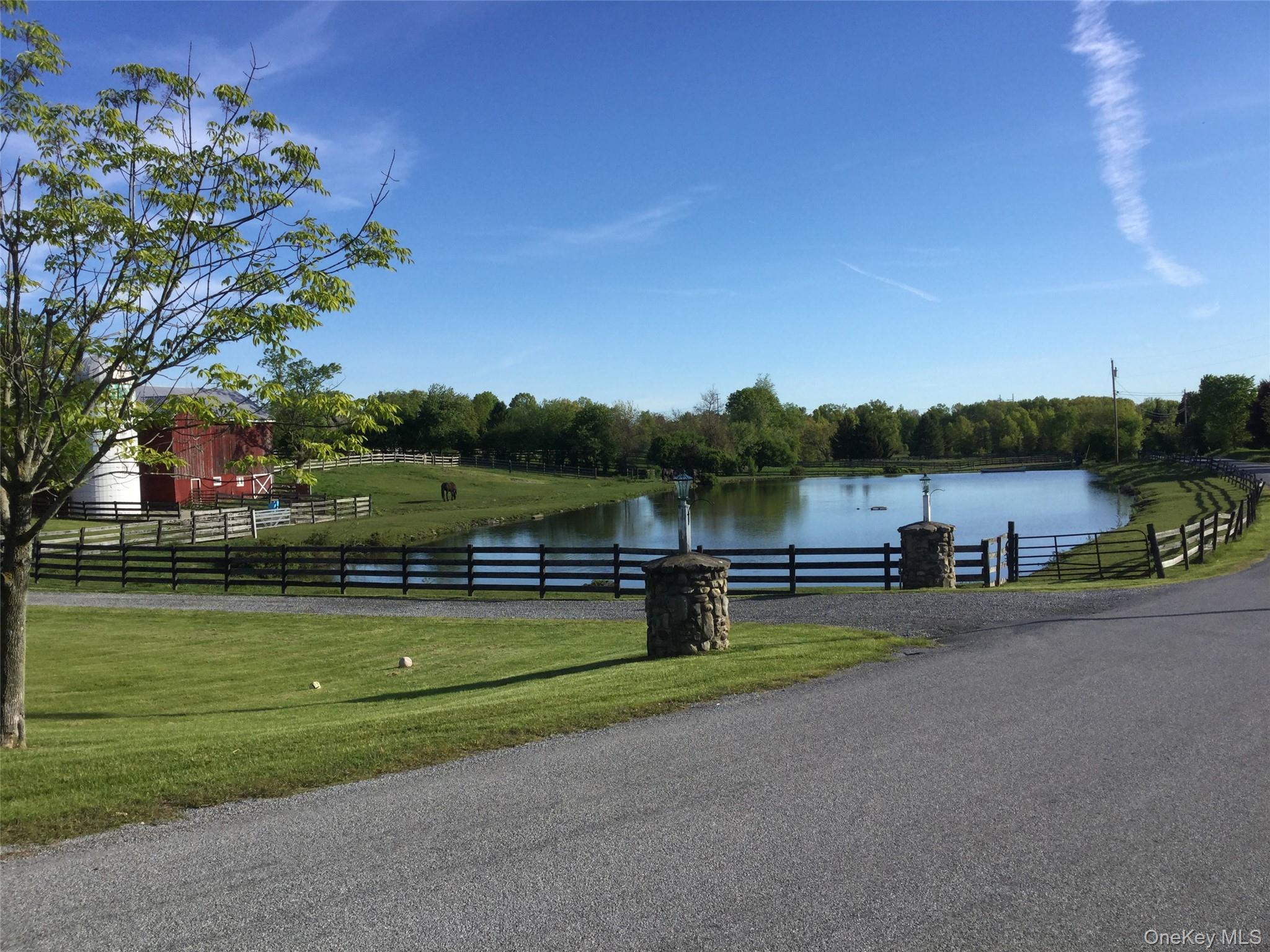 53 Day Road Campbell Hall, NY 10916 - Photo 5 of 31 a view of a lake with a big yard
