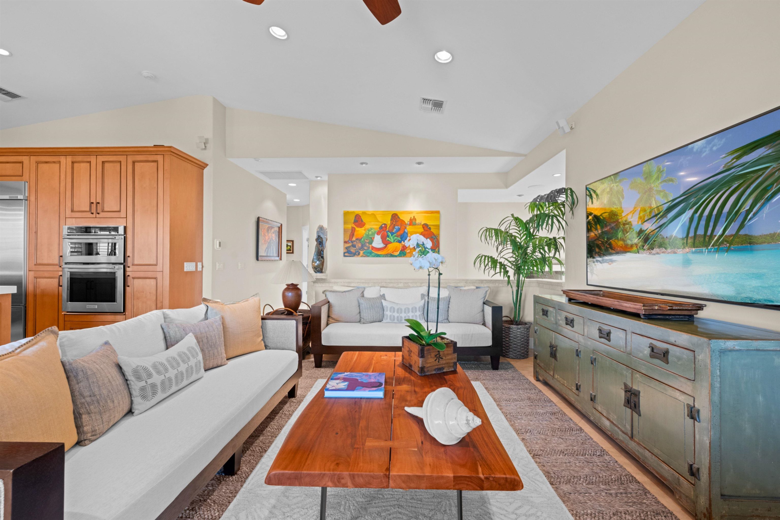 17 Kahana Ridge Place Lahaina, HI 96761 - Photo 11 of 50 a living room with furniture fireplace and flat screen tv