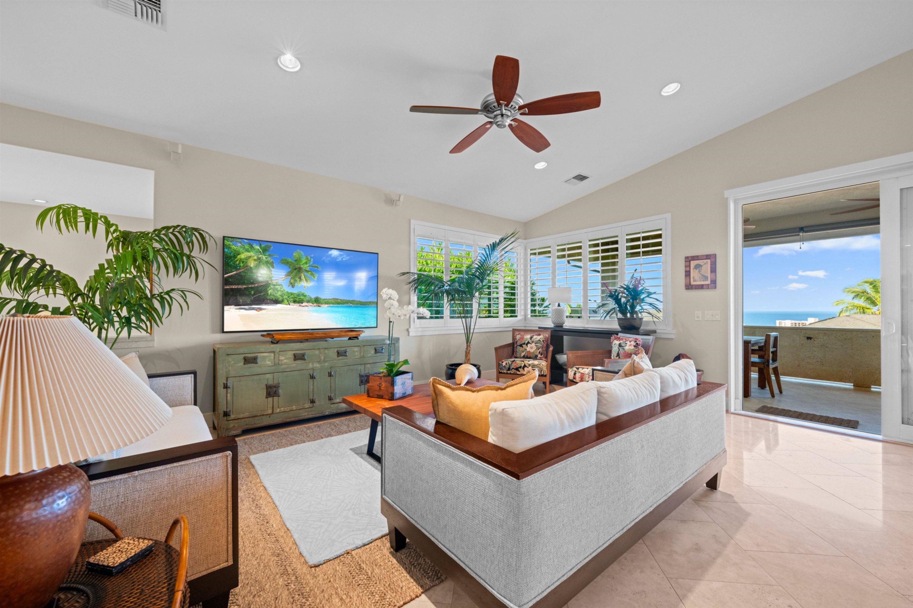 17 Kahana Ridge Place Lahaina, HI 96761 - Photo 13 of 50 a living room with furniture and a flat screen tv