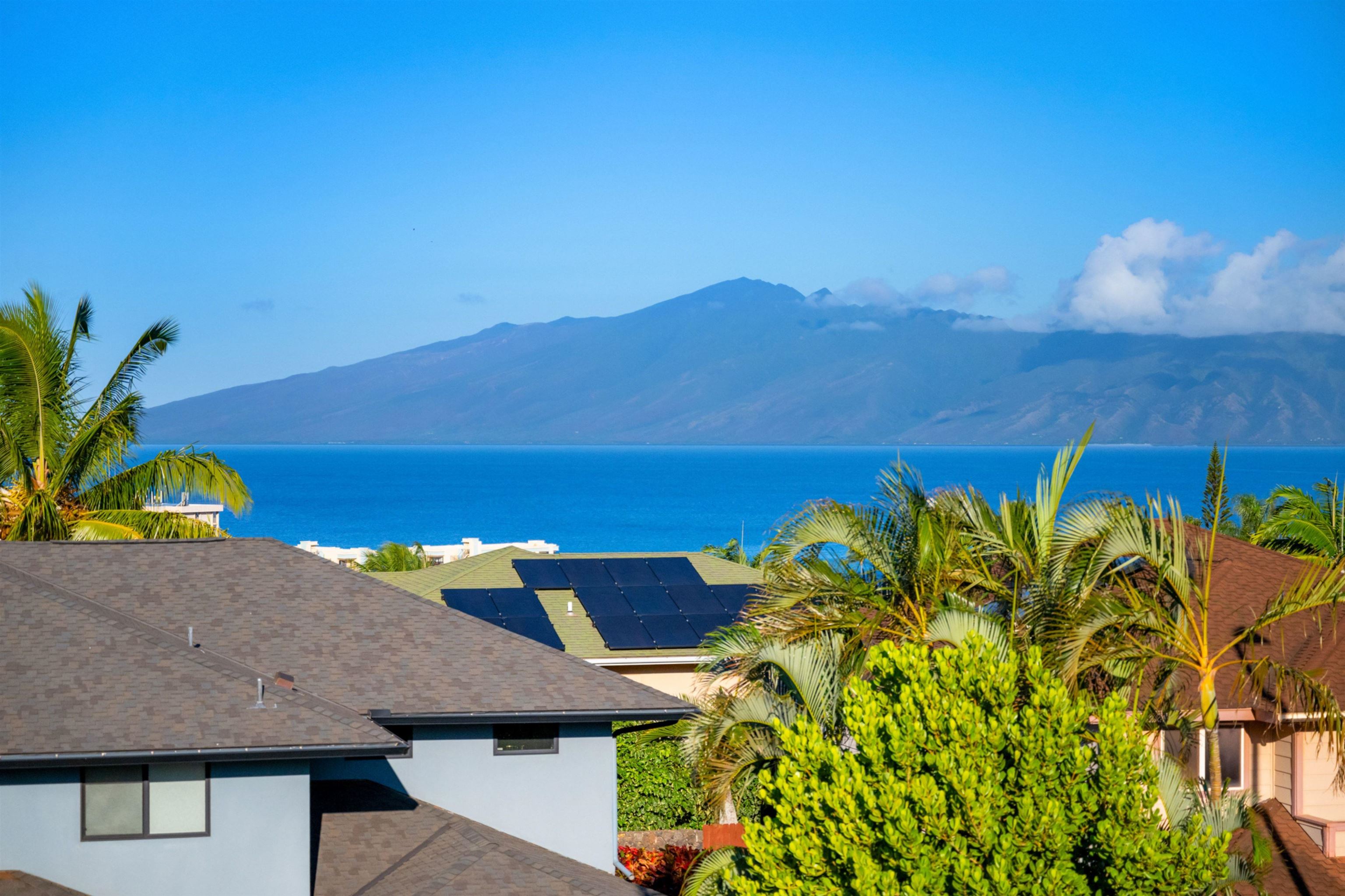 17 Kahana Ridge Place Lahaina, HI 96761 - Photo 17 of 50 a view of a swimming pool with a yard