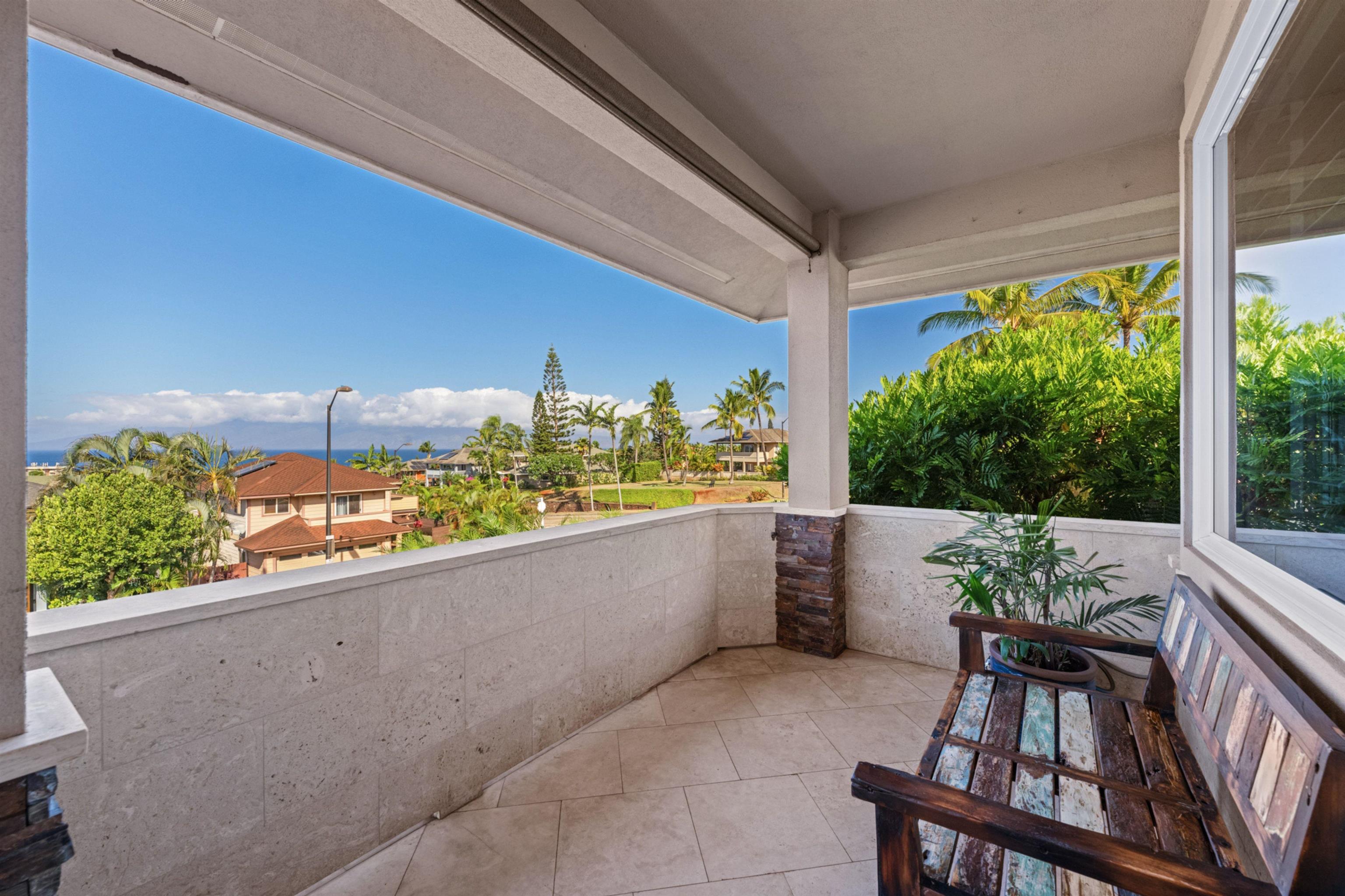17 Kahana Ridge Place Lahaina, HI 96761 - Photo 20 of 50 a view of a chairs and table in the balcony