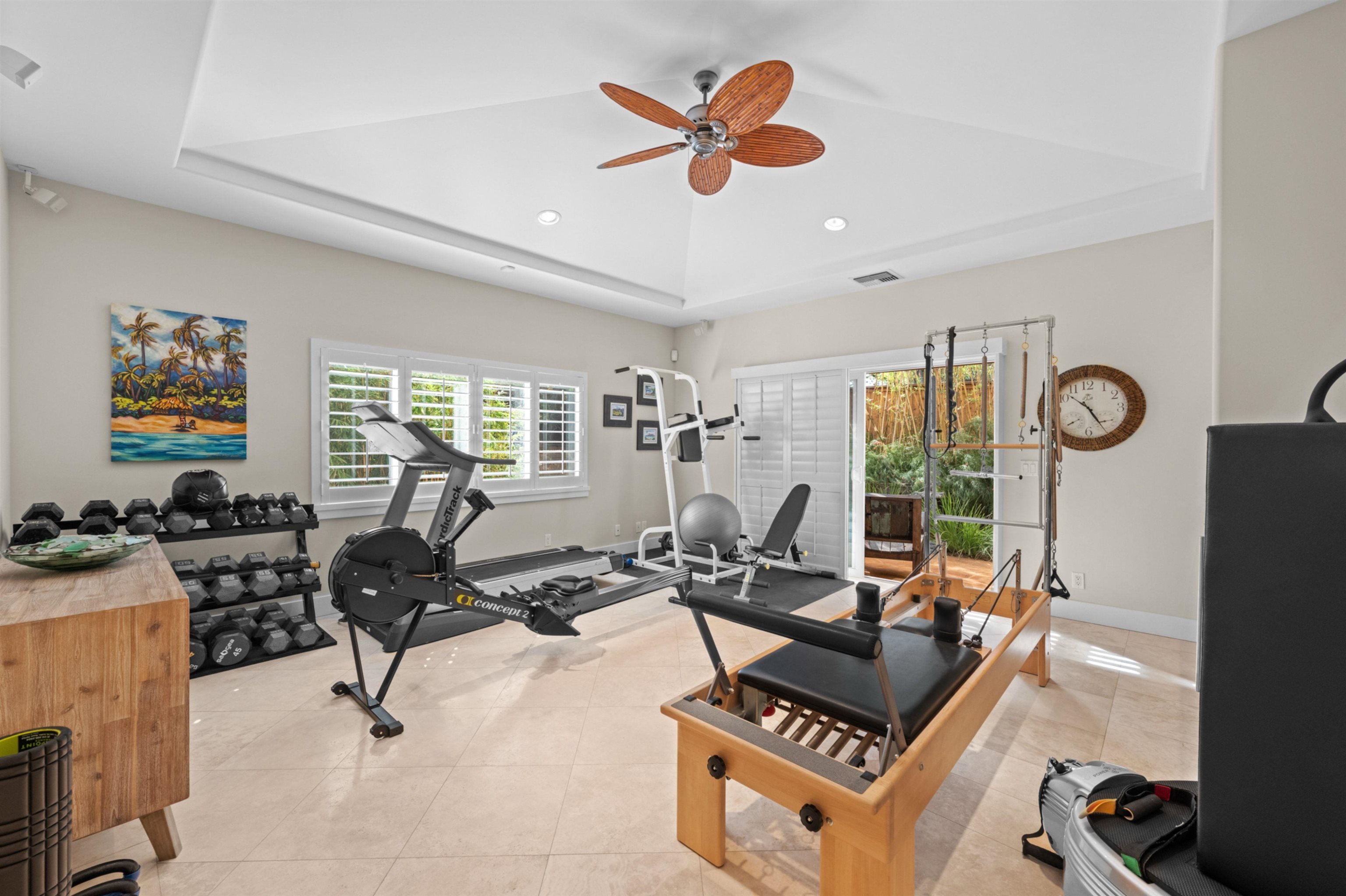 17 Kahana Ridge Place Lahaina, HI 96761 - Photo 30 of 50 a living room with furniture a flat screen tv and a window
