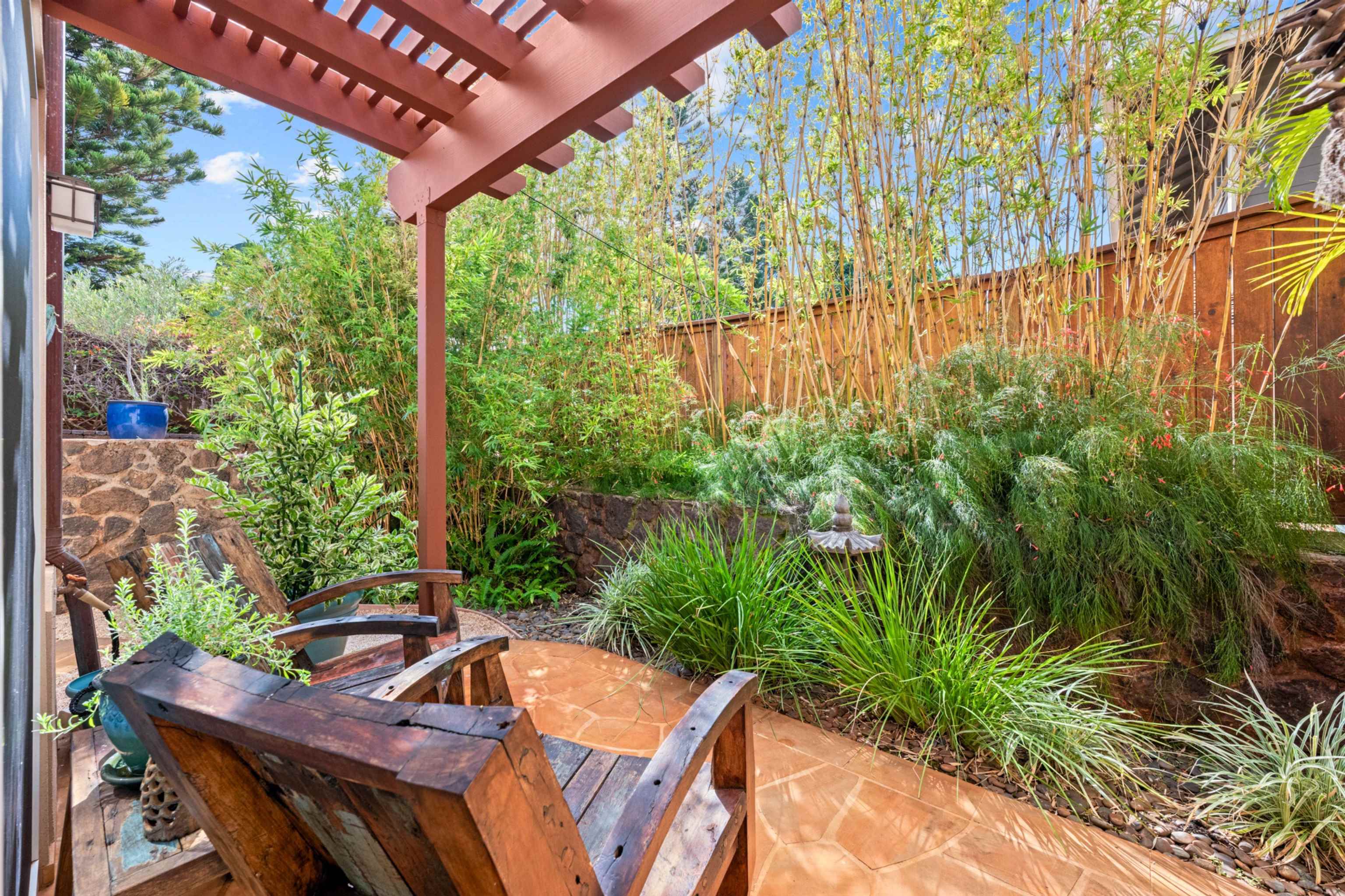 17 Kahana Ridge Place Lahaina, HI 96761 - Photo 32 of 50 a view of a chairs and table in a patio