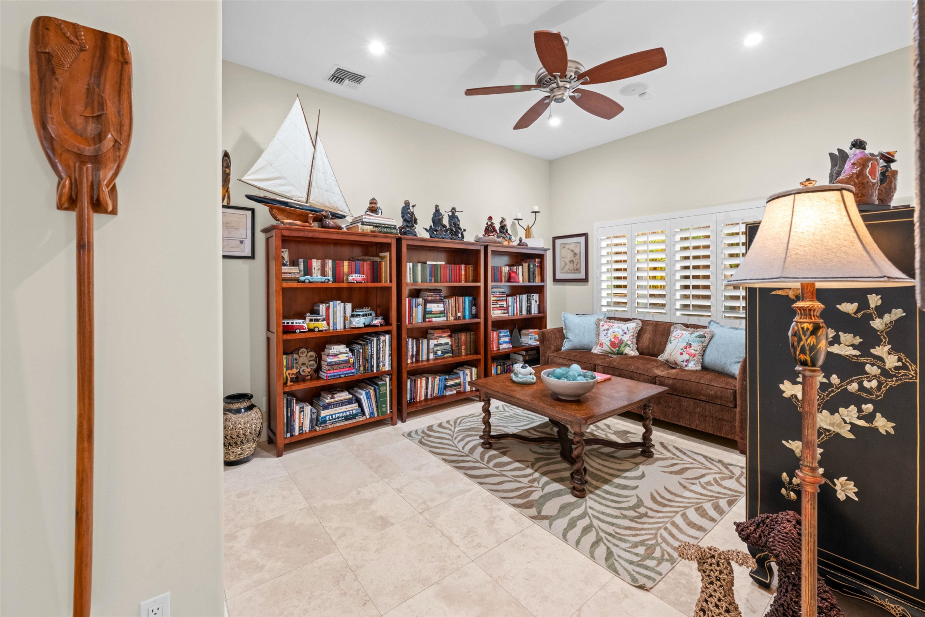 17 Kahana Ridge Place Lahaina, HI 96761 - Photo 38 of 50 a living room with furniture cabinets and a window