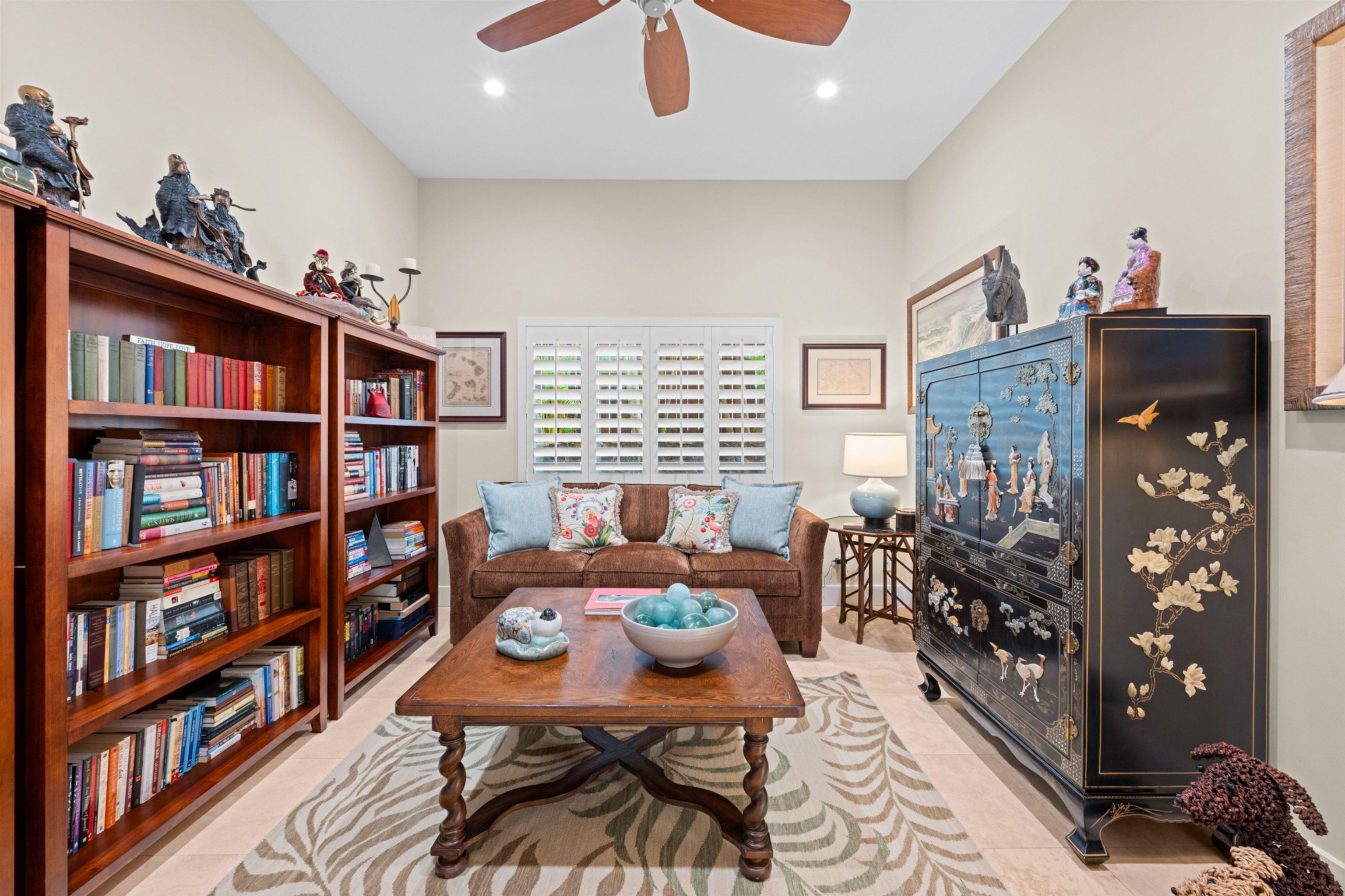 17 Kahana Ridge Place Lahaina, HI 96761 - Photo 39 of 50 a reading room with furniture window and book shelf