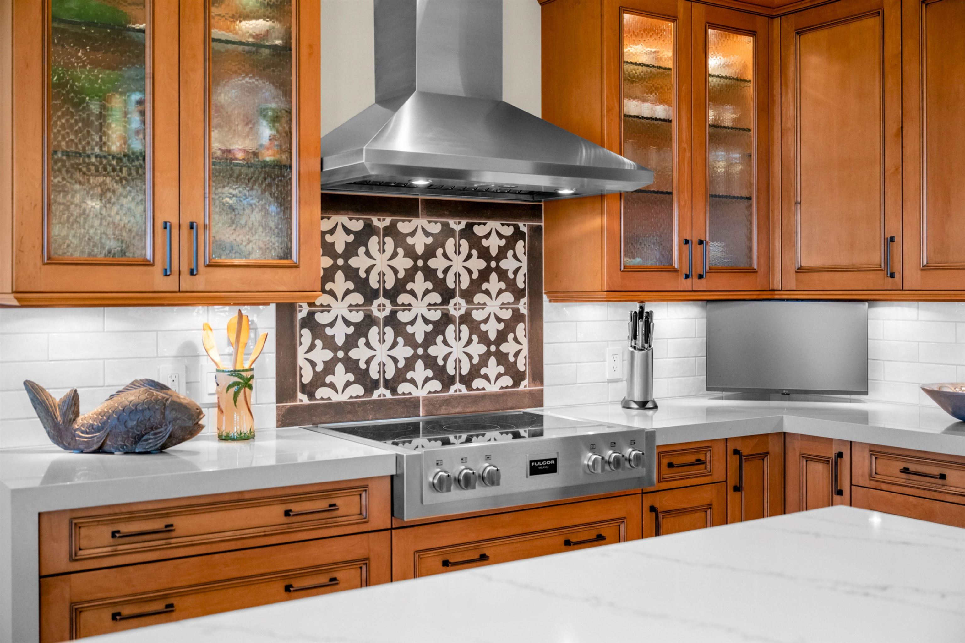 17 Kahana Ridge Place Lahaina, HI 96761 - Photo 8 of 50 a kitchen with stainless steel appliances granite countertop a sink a stove and next to a window
