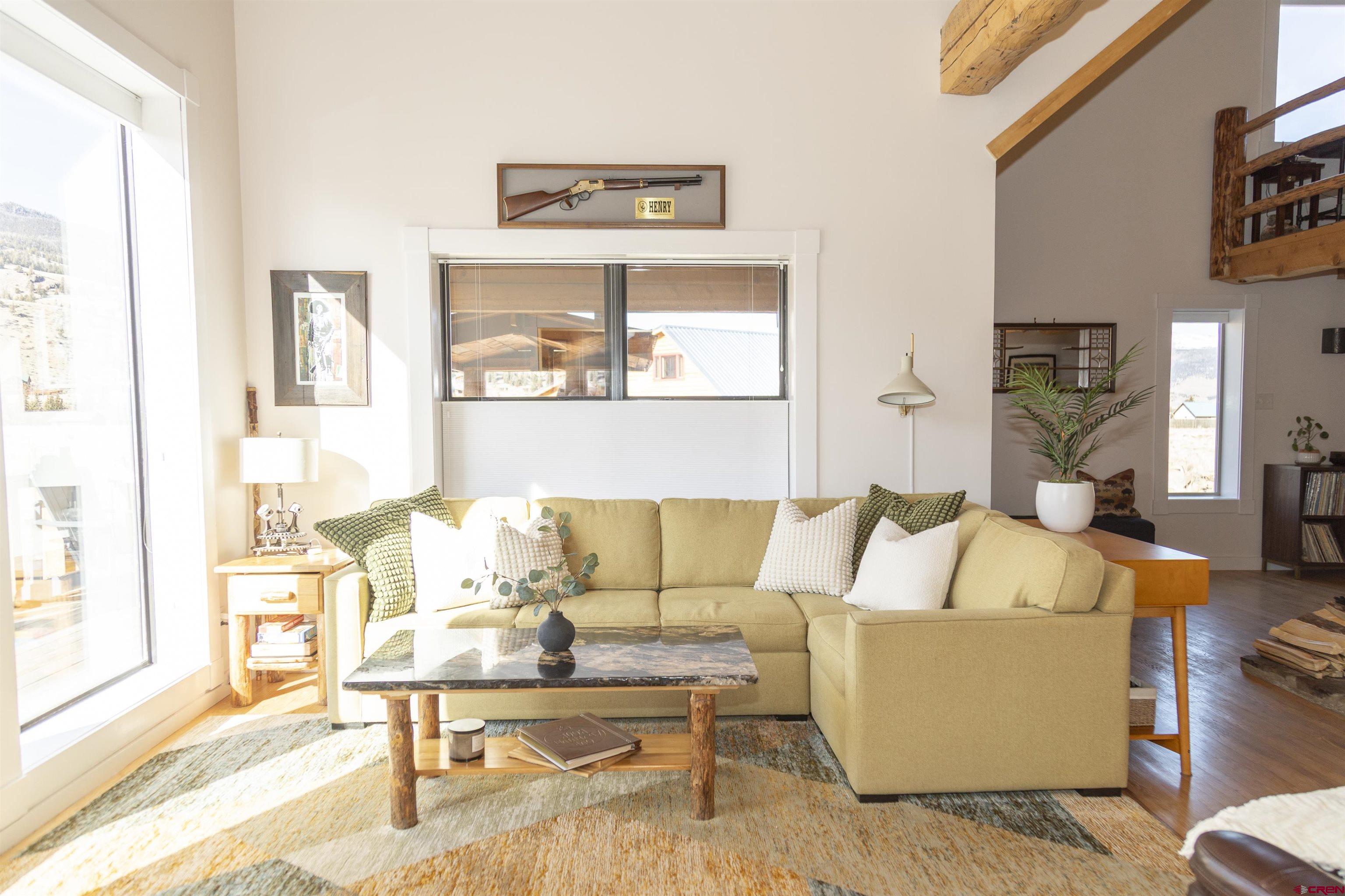 148 Rio Grande Drive Creede, CO 81130 - Photo 12 of 38 a living room with furniture and a table