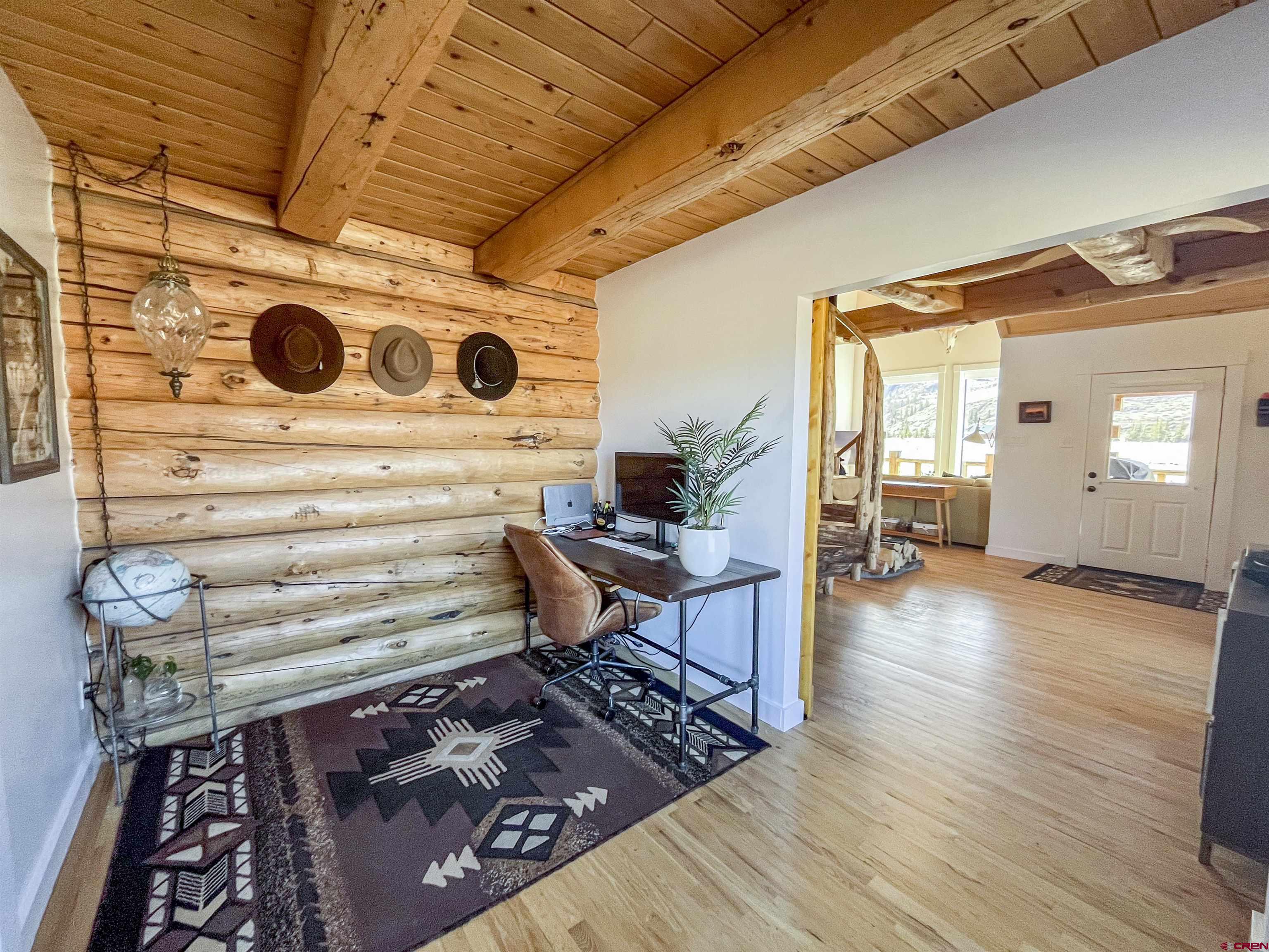 148 Rio Grande Drive Creede, CO 81130 - Photo 18 of 38 a view of workspace with wooden floor