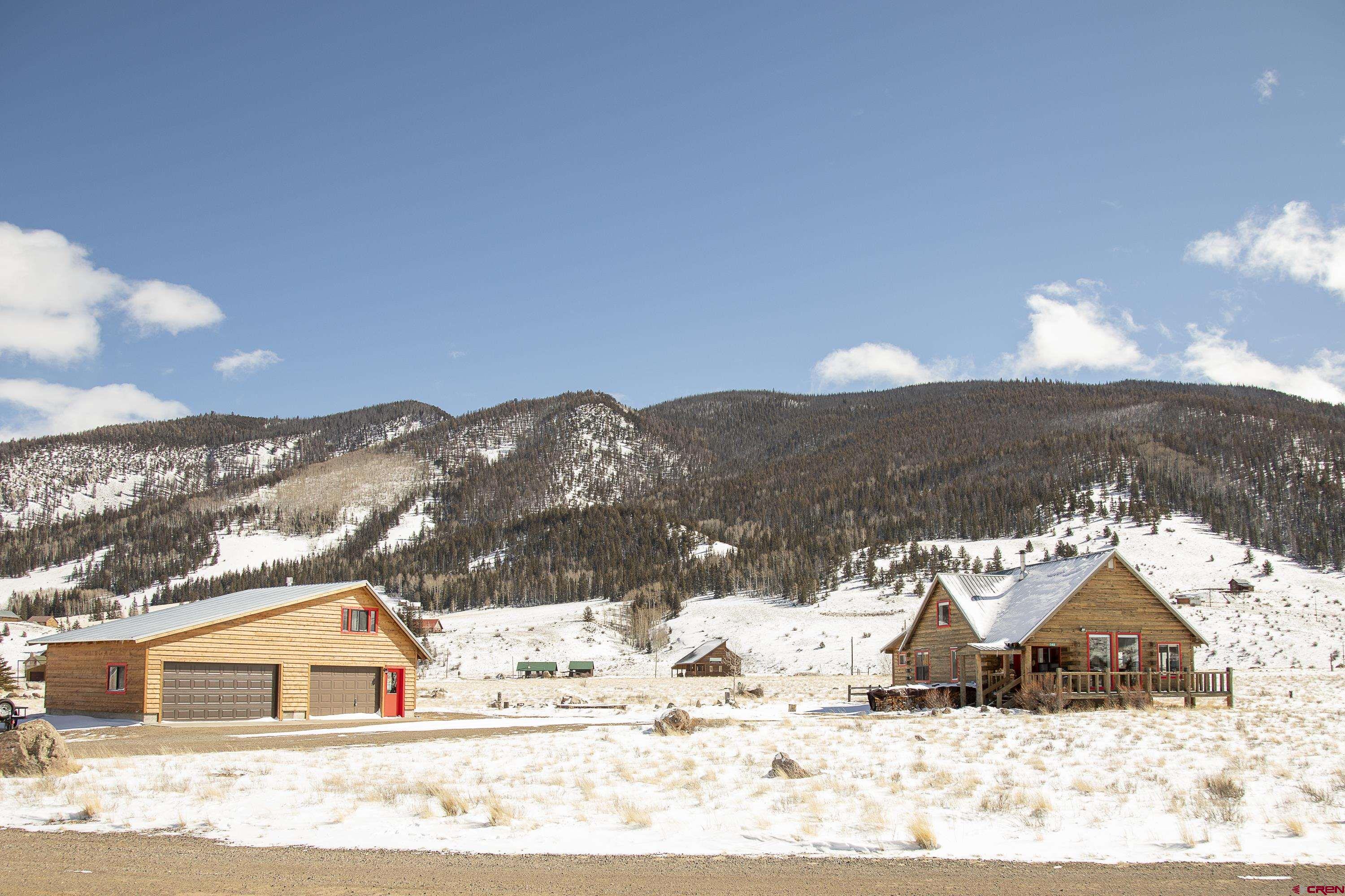 148 Rio Grande Drive Creede, CO 81130 - Photo 37 of 38 a view of a house with a snow in the yard