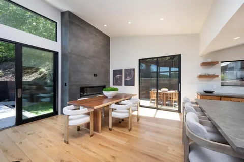 a outdoor space with furniture and wooden floor