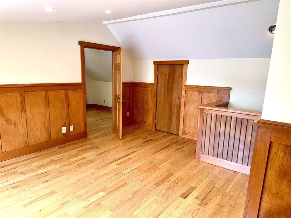 39 Newman Road Malden, MA 02148 - Photo 22 of 27 a view of an empty room with wooden floor and a window