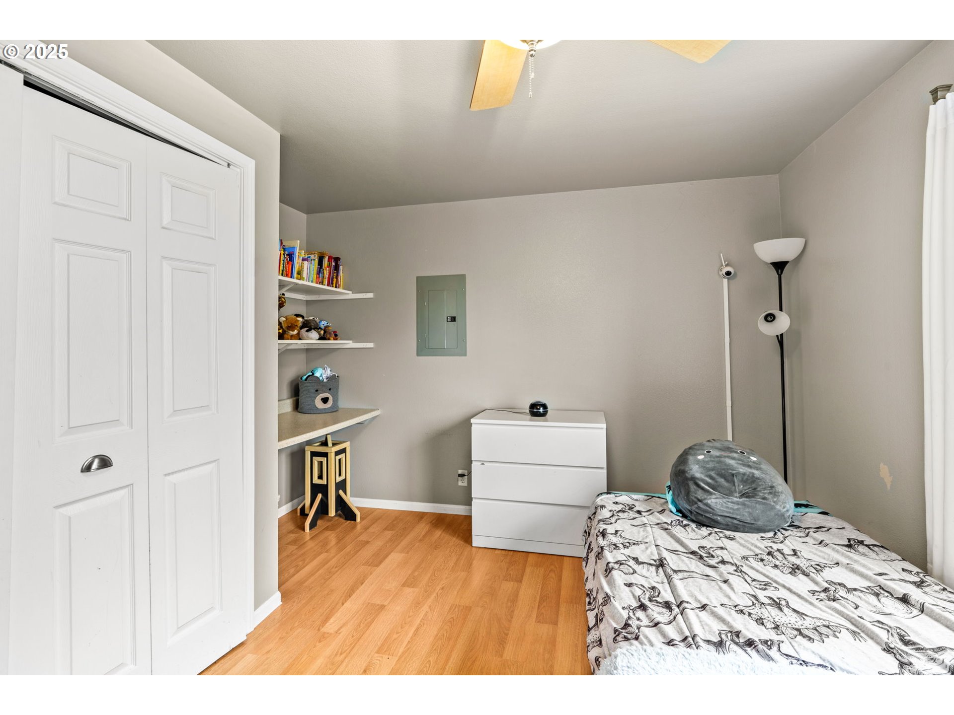 2945 Hayden Bridge Road Springfield, OR 97477 - Photo 13 of 46 a bedroom with a bed and a cabinets
