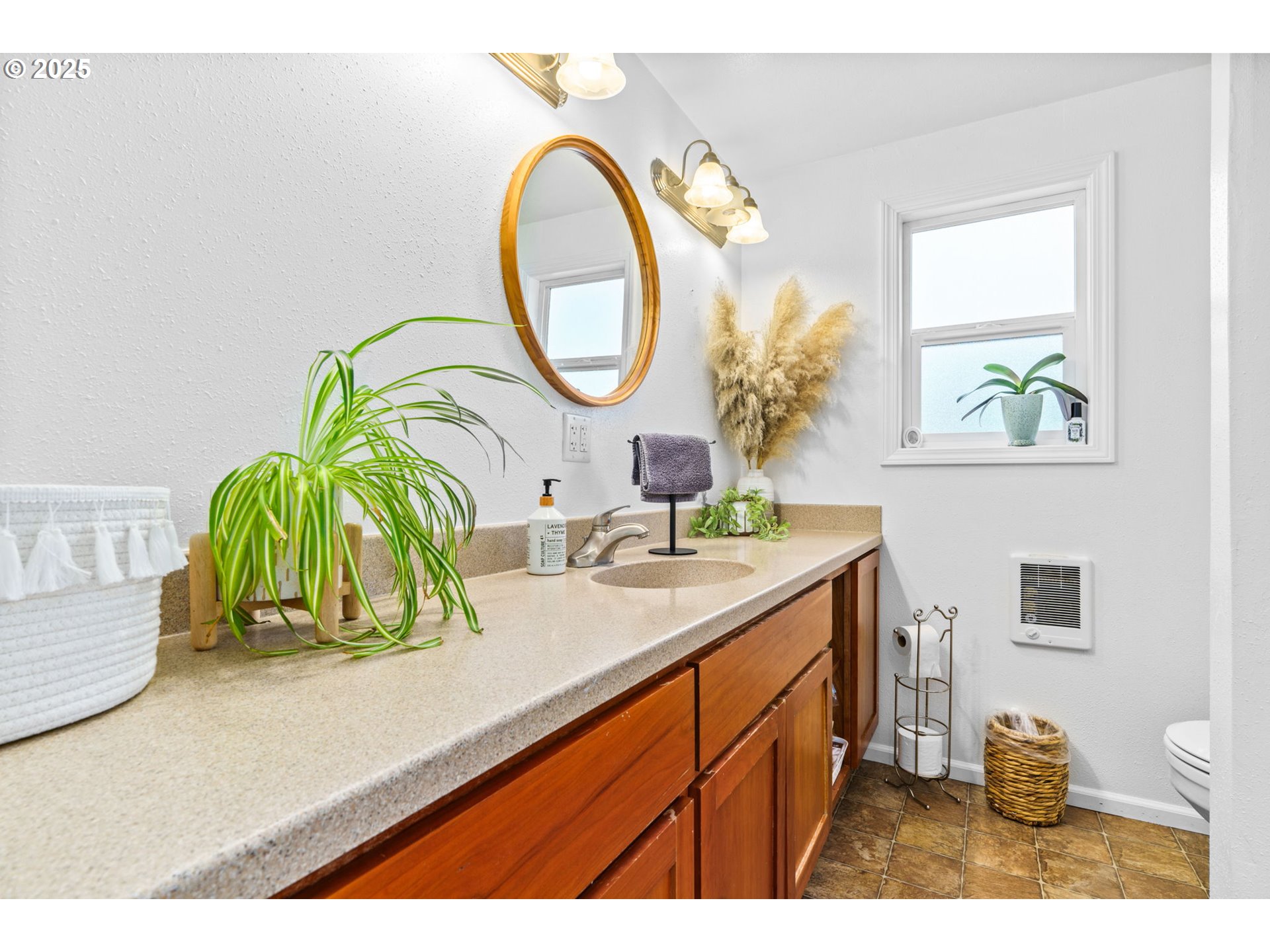 2945 Hayden Bridge Road Springfield, OR 97477 - Photo 21 of 46 a bathroom with a sink and a mirror