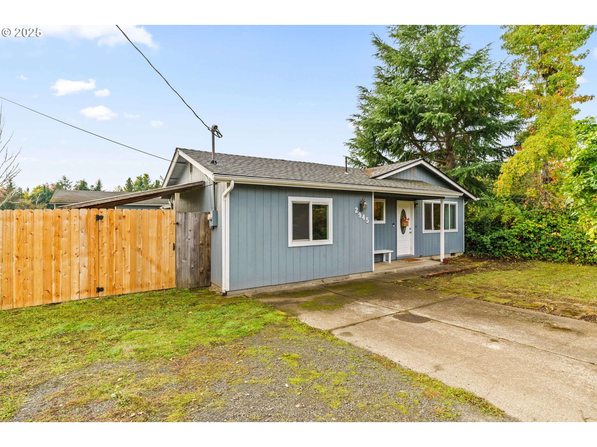 2945 Hayden Bridge Road Springfield, OR 97477 - Photo 46 of 46 a view of a house with pool and wooden fence