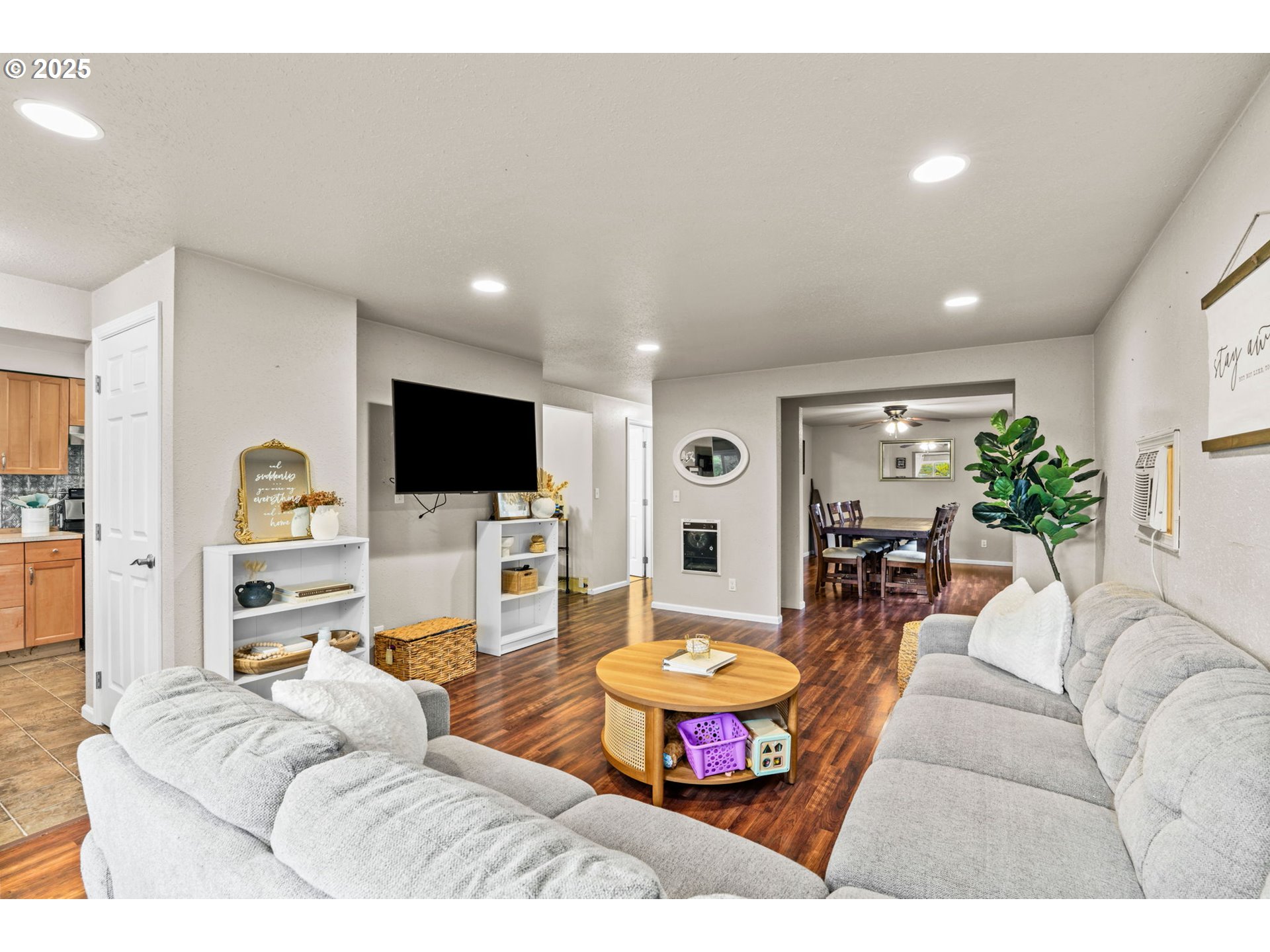 2945 Hayden Bridge Road Springfield, OR 97477 - Photo 5 of 46 a living room with furniture and a flat screen tv