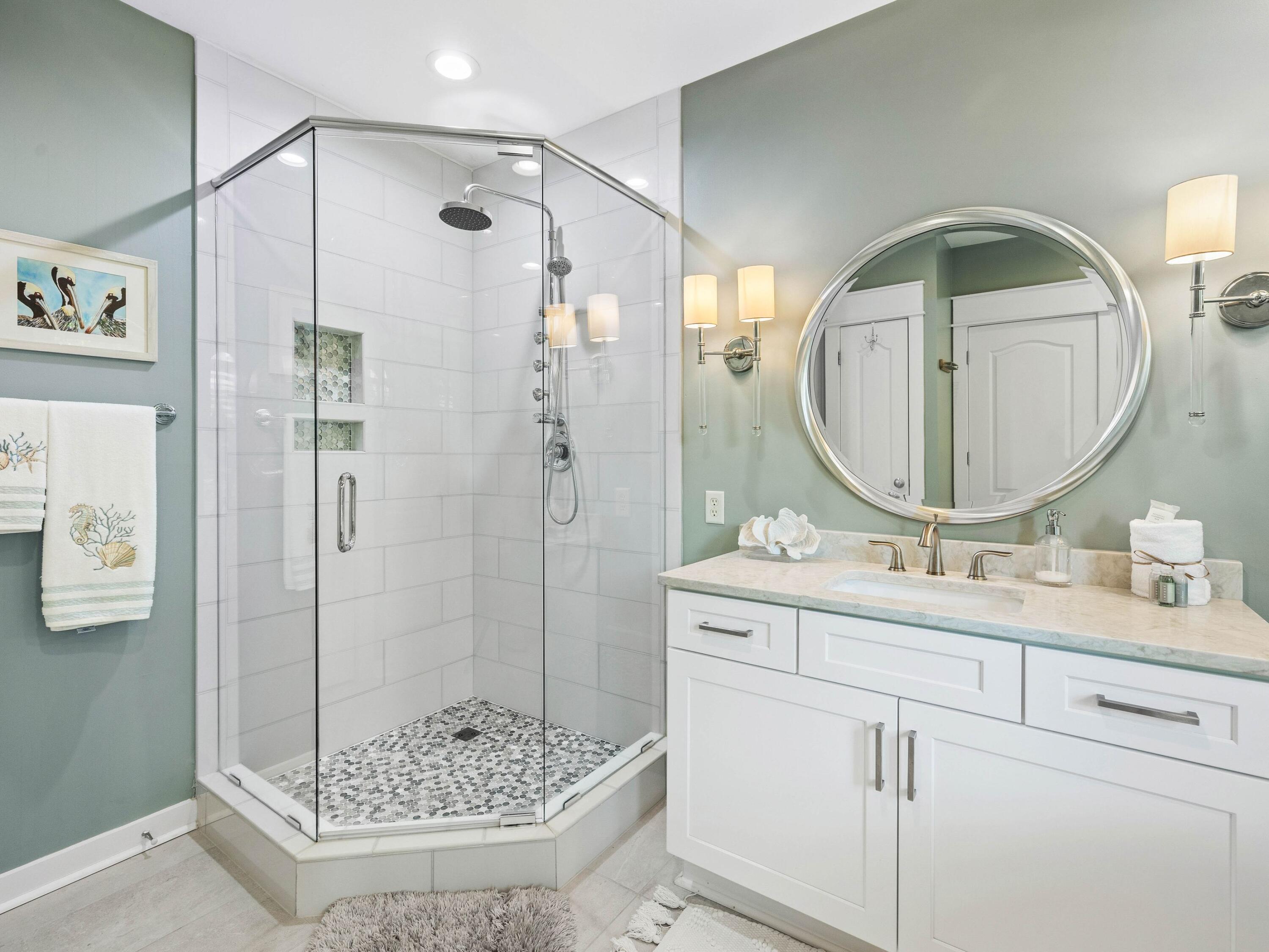 4545 East County Highway 30A, Unit C101 Santa Rosa Beach, FL 32459 - Photo 12 of 29 a bathroom with a double vanity sink mirror and shower