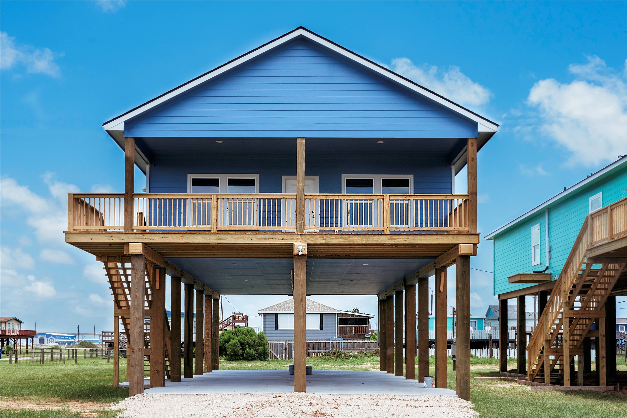 528 Thunder Road Surfside Beach, TX 77541 - Photo 1 of 22 a front view of a house with a yard