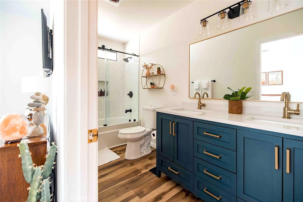 61029 Navajo Trail Joshua Tree, CA 92252 - Photo 21 of 41 a bathroom with a sink a toilet and shower