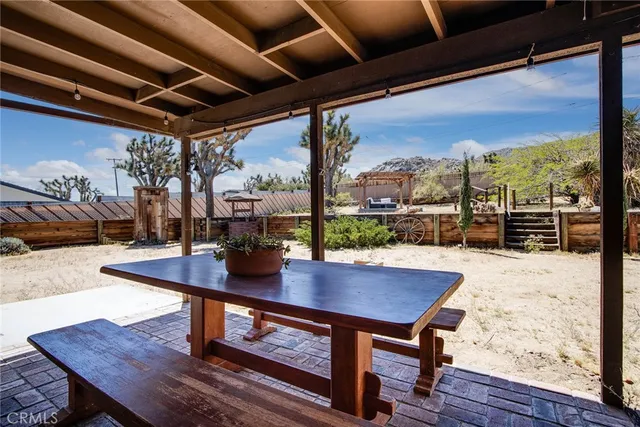 a view of a table and chairs in the kitchen