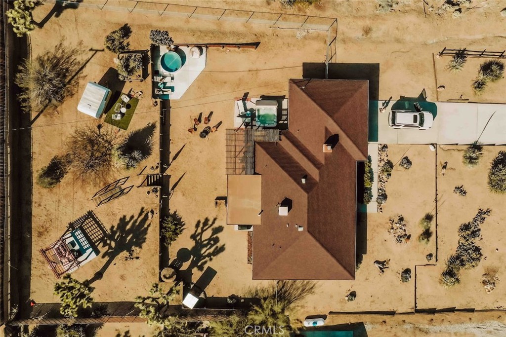 61029 Navajo Trail Joshua Tree, CA 92252 - Photo 37 of 41 an aerial view of a house with a yard